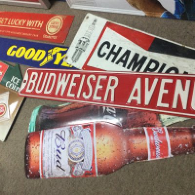 A collection of metal advertising signs including Lucky strike, Budweiser, Dr Pepper, Good year etc this lot cannot be posted