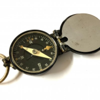 A Vintage Busch DRGM compass and signal mirror.
