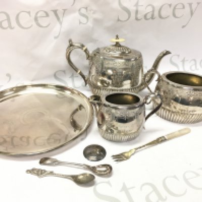 Silver plated items including a three piece tea set dated 1883, Joseph Rodgers & Sons dish, cutlery pieces. Postage category B