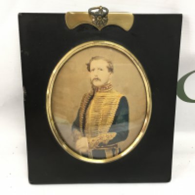A framed ebonised photograph portrait of a gentleman in military dress. NO RESERVE