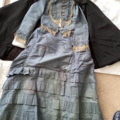 A Good Victorian quality silk bustle dress and cape.