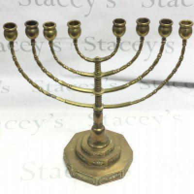 A brass Menorah 41cm tall 38cm wide . Postage category C