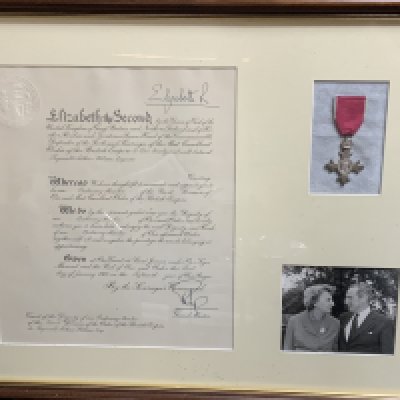 A Framed Civilian MBE awarded to Reginald Arthur Wilson for his works with TMT (The Migrane Trust) January 1967. (D)