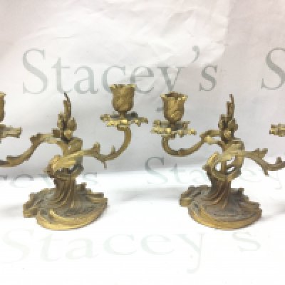 A pair of French ormoulo candelabras, approximately 15cm tall. 21cm wide. Postage category c