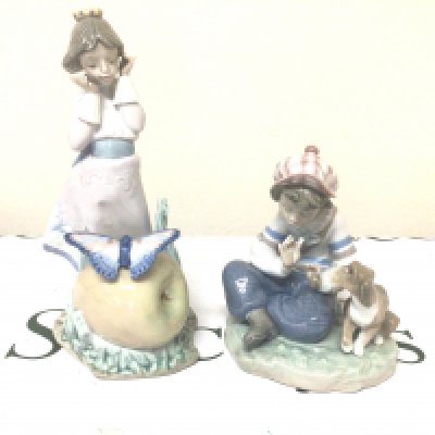 Two Lladro figures a boy seated with his dog and young girl with a butterfly (2)