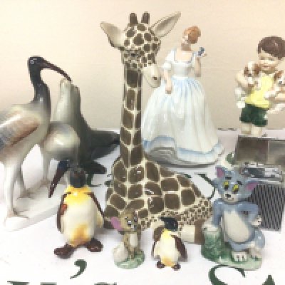 A collection of Worcester Doulton Wade and other ceramic figures a lighter in the form of a Rolls Royce Car grill. and other oddments.