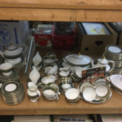 A Royal Doulton service in Vanborough pattern. Shipping category D.