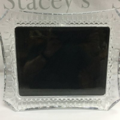 A large Waterford crystal photograph frame, approx 34cm x 29cm. Shipping category D.