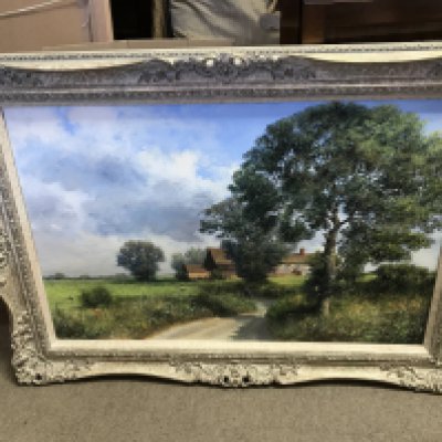 A framed oil painting of a rural landscape by Clive Madgwick (1934-2005) Frame dimensions 92x66cm