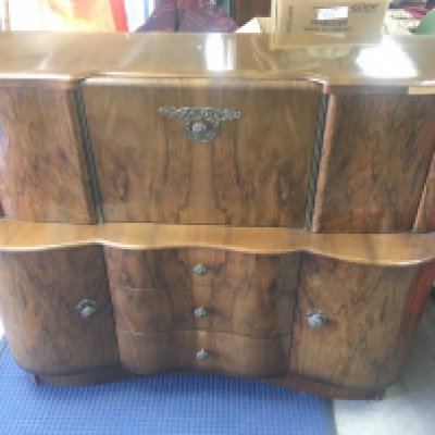 A walnut cocktail cabinet. 130cm wide 50cm deep and 108cm tall.