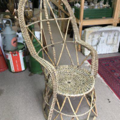 A vintage Rattan cane conservatory chair , dimensions 104cm tall 51cm wide- NO RESERVE