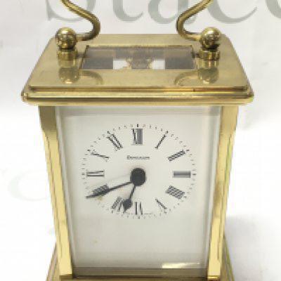 Dominion Carriage clock with key, seen working . This lot cannot be posted