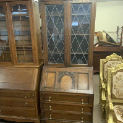 An oak bureau bookcase with lead glazed doors. 202cm x 73cm