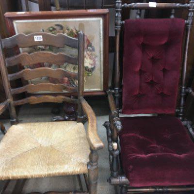 Two rocking chairs with rush and upholstered seats .