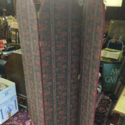 A folding screen upholstered with floral tapestry, approx height 184cm. Shipping category D.