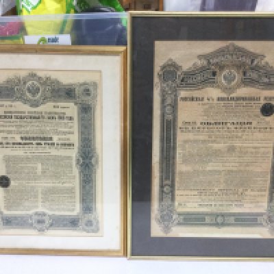 Six framed and glazed share certificates, one frame a/f. Shipping category D.- NO RESERVE