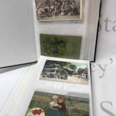 Two albums of vintage postcards