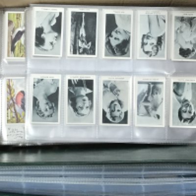 Box of cigarette cards in sets in sleeves and albums mixed sets and odds part sets .postage category B