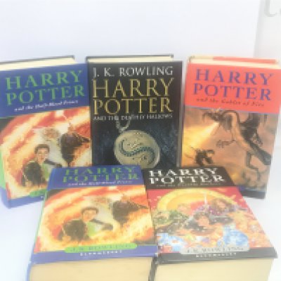 A collection of Harry Potter books some first edition