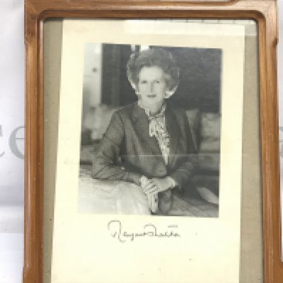 A framed signed picture of Margaret Thatcher the first female prime minister of the United Kingdom.