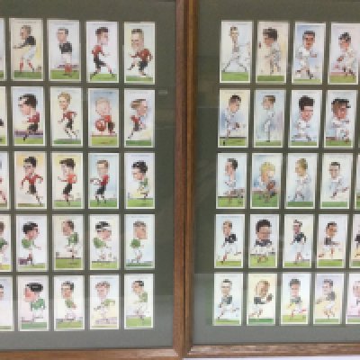 Two framed and glazed Wills cigarette card sets comprising rugby and cricket players.
