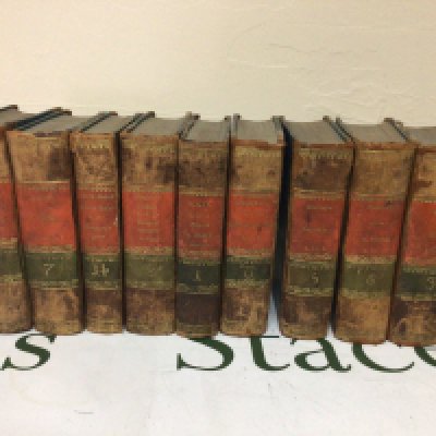 A collection of half leather books 1829 and others.