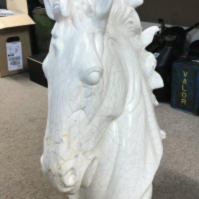 A ceramic horse head sculpture, possibly Italian. with some damage .67cm tall . This lot cannot be posted- NO RESERVE