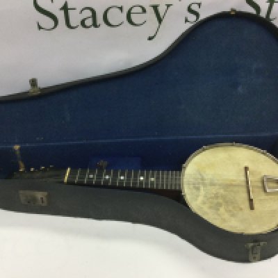 A circa 1920s open backed banjolin. Shipping category C.