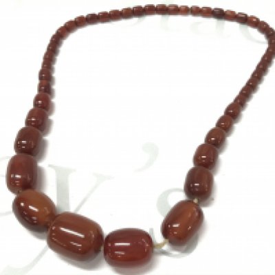 Genuine Bakelite cherry amber colour necklace . 65g 60cm Postage category A