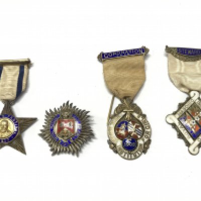 Four early 20th century silver and enamel Masonic stewards jewels including 1902 Edward VII coronation a quantity silver and enamel badge 1913 and two others dated 1917 & 1920. Postage category A