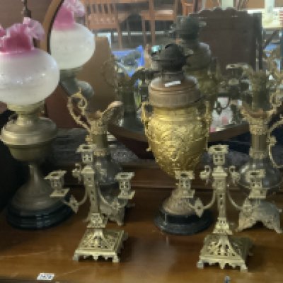 A gilt metal mounted oil lamp base, a pair of brass candelabra, Evers, Victorian oil lamp with etched shade.