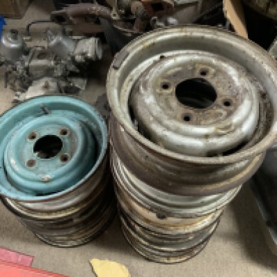 Vintage Mini Cooper parts. 8 mixed steel wheels. 28cm Diameter.
