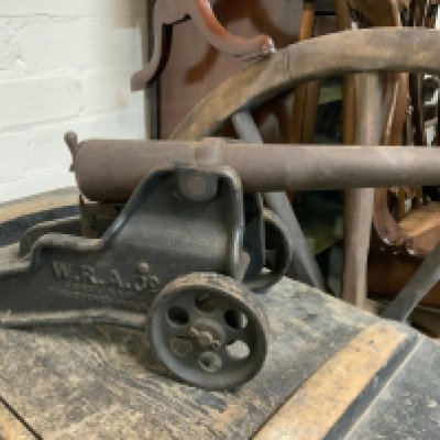 A 10-BORE STARTING GUN BY THE WINCHESTER REPEATING ARMS CO., U.S.A., CIRCA 1901 with tapering rolled steel barrel inscribed to top with maker's name and dated '1901', mounted on heavy cast iron carriage inscribed 'W.R.A.Co.' -- 7&frac12; x 17in. (19 x 43cm.)