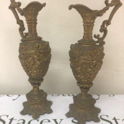 A pair of Victorian gold coloured spelter urns with perfuse decoration. Height 46cm- NO RESERVE