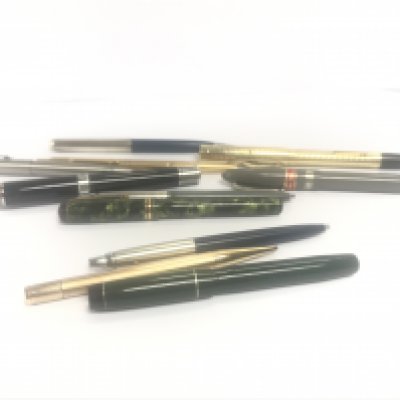 A collection of vintage fountain pens and pencils including Parker, Swan, Conway Stewart, Rolled Gold Pencil