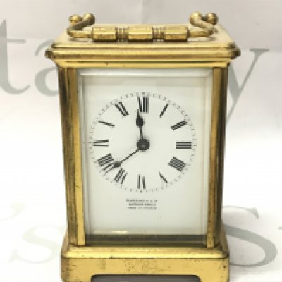 A Harrod & Ltd carriage clock. This lot cannot be posted