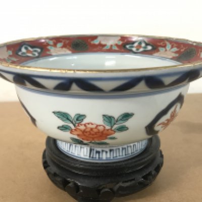 A Japanese Imari ware bowl with stand , 6 character mark at base. 8.5cm tall 18cm wide . This lot cannot be posted- NO RESERVE
