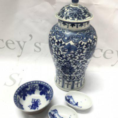 A Chinese blue and white vase with lid and four character mark at base (lid damaged and restored), koi blue and white bowl and two small bowls. This lot cannot be posted