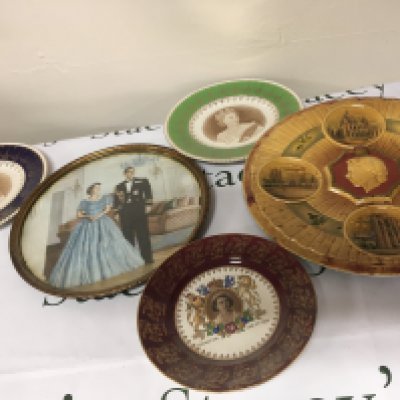 A collection of Elizabeth II Royal Commemorative including a framed image of Elizabeth Il with the Duke a large plaster wall plaque and other plates. NO RESERVE.