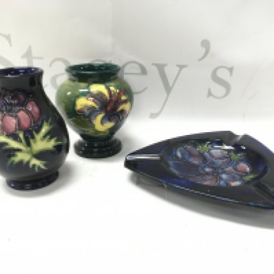 Moorcroft small vases (10cm tall) and an ashtray (13cm wide). This lot cannot be posted