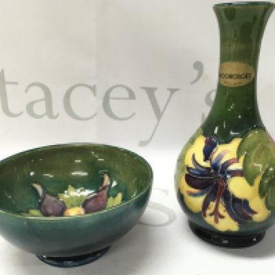 Moorcroft Hibiscus vase (16cm tall) and Columbine bowl (5.5cm tall 11cm wide). No obvious damage or restoration. This lot cannot be posted