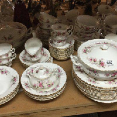 A Royal Albert Lavender Rose tea dinner service comprising tureens dinner plates cups saucers And side plates.
