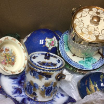 Two boxes of ceramics including blue and white plates, a Carltonware ginger jar and cover, biscuit barrels etc.