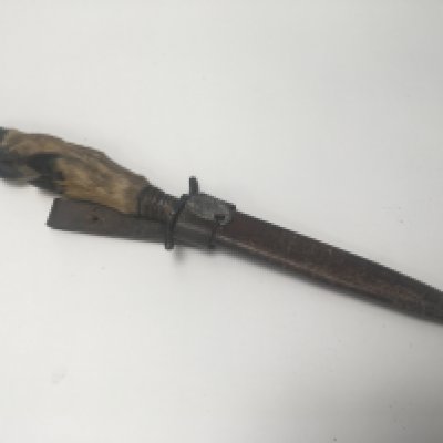 A German Fighting knife possible I world war Imperial. With a deer hoof handle the leather scabbard with applied additional Third Reich badge 1936.