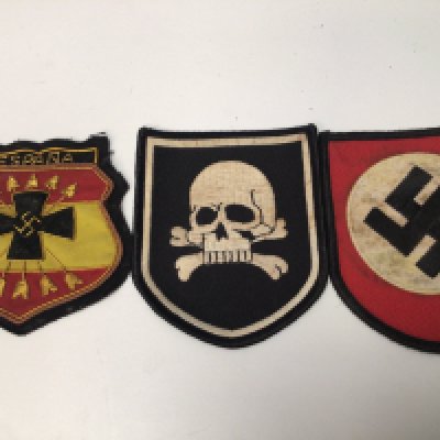 Three embroidered cloth badges a Spanish Third Reich and SS. (3)