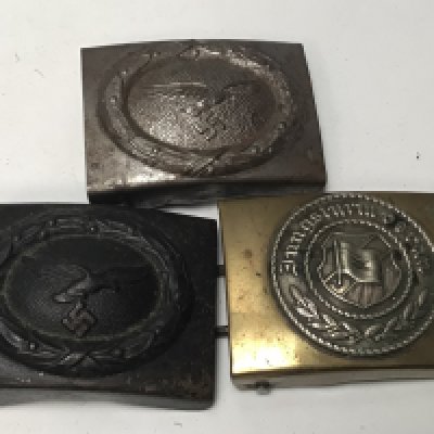 Two German Third Reich Belt buckles two Luffwaffe one with a black finish and a Jungstrum belt buckle (3)