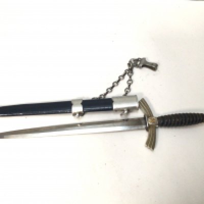 A German Third Reich first pattern Luftwaffa dagger with aluminium chain hanger makers stamp to the blade WKC leather and metal scabbed.