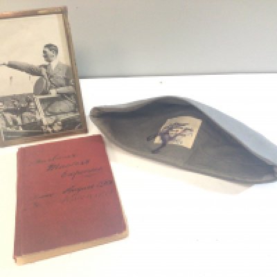 A German Third Reich Luftwaffe cloth cap a photograph of Adolf Hitler and a hand written Harbour Masters Expenses book 1906-1914.