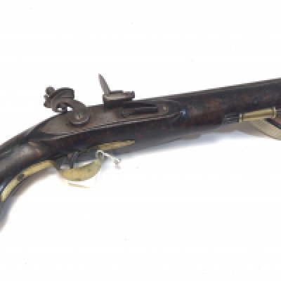 A late 18th century flintlock pistol with brass fittings steel barrel and action stamped 137 Ward.