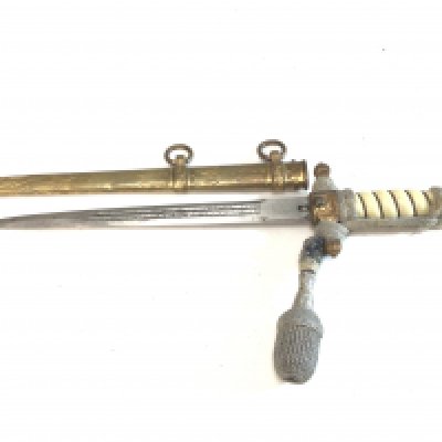 A German II world war Third Reich Kriegsmarine officers presentation dagger with attached pommel the etched blade with makers stamp.